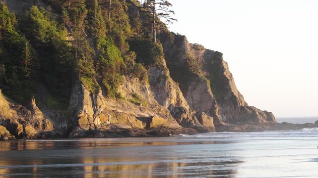 Slow motion of the waves crashing on Smuggler's Cove at sunset.