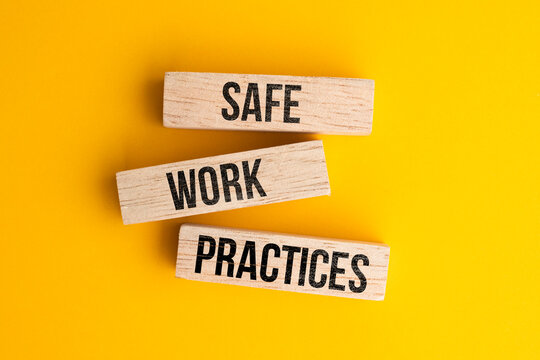 Wooden block with the words safe work practices
