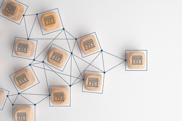 Business sale growth and expand shop franchise concept, Store illustration print screen on wooden cube block connection link with others shop and supermarket.