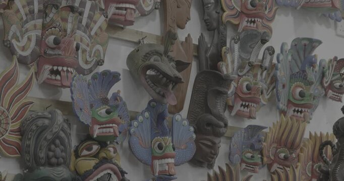 Many old colored Ceylon traditional Wooden masks Sculptures. Sri Lankan Flower Bird Devil Mal Gurulu Raksha , Fire Devil mask, Gini Raksha, Mayura Raksha - Peacock Devil Mask