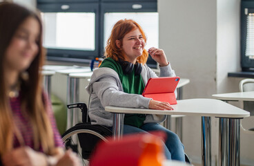 Inclusive classroom scene with student using wheelchair.