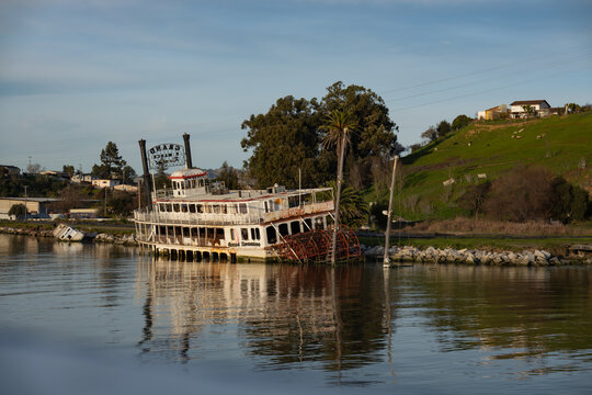 Abandoned Grand Romance paddlewheel riverboat partially submerged along the Vallejo waterfront on February 7, 2026 in Vallejo, California  