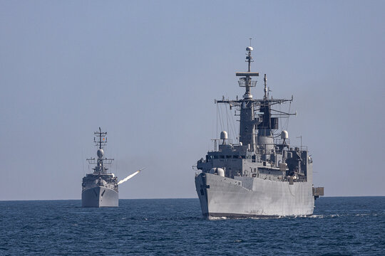 Military navy ships in sea war battle.