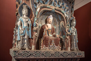 Fototapeta premium Ancient Bodhisattva statues in the Mogao Caves of Dunhuang, China.