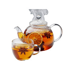 Hot tea with orange and star anise in glass teapot and cup