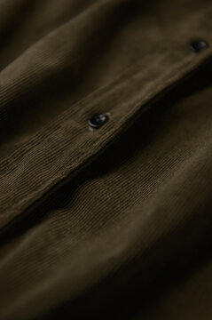 close up of button jacket. close up of fabric. garment textile.