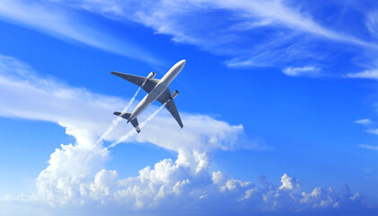 Fototapeta na wymiar Horizontal nature background with aircraft and Jet trailing smoke in sky. Airplane and condensation trail. Foggy jet trail and plane in blue sky with white clouds. Traveling the world concept