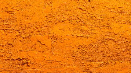 Fototapeta premium Vibrant Orange Textured Wall Background with Rough Surface.