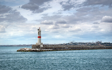 Lighthouse on a breakwater. Haydarpasa, Kadikoy. Istanbul, Turkey.