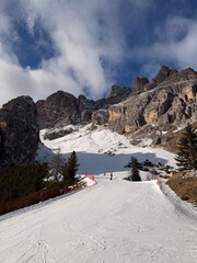 Chairlift on a ski slope of Tofana leading up to the top of the mountain in the peak of the winter season