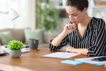 Self employed reading carefully a contract working at home