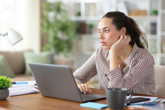 Distracted self employed with lost look working at home