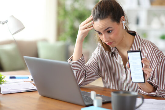 Worried tele worker showing problem during a video call