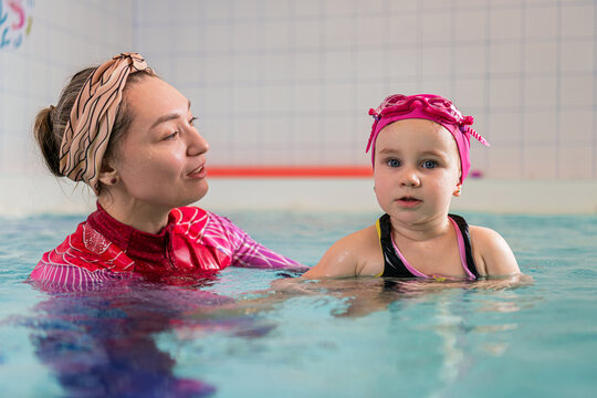 Early swimming education in an indoor pool.