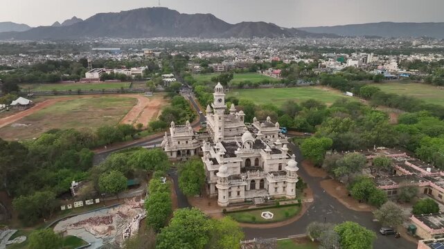 Mayo college boarding school heritage building surrounded by garden and Aravalli hills, Ajmer, Rajasthan, drone shot