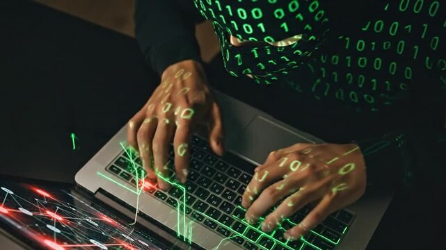 Hacker Typing on Keyboard with Binary Code Reflection