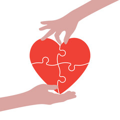 Hands connect a heart puzzle