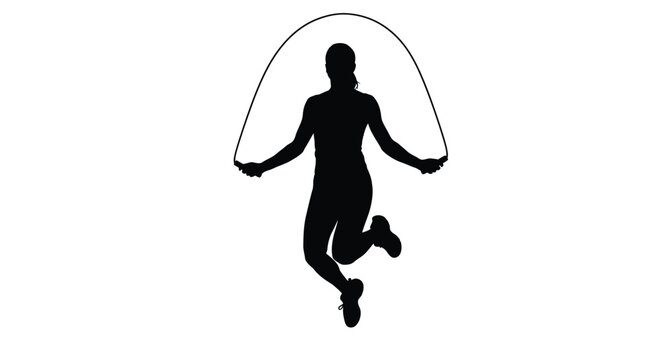 Silhouette of a person mid jump while skipping rope