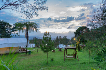 Outdoor garden in the glamping area decorated for summer parties at the campsite