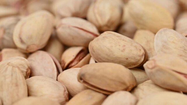 video of a mix of almonds, pistachios, cashews, and pine nuts