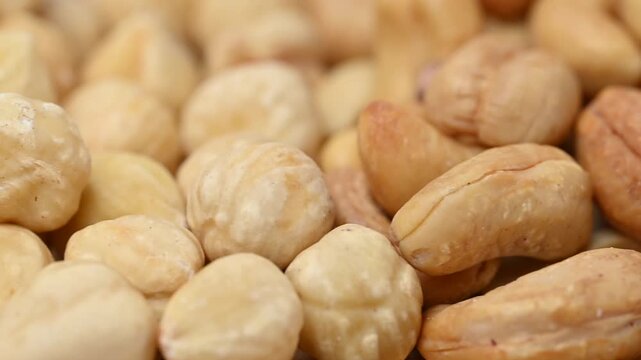 video of a mix of almonds, pistachios, cashews, and pine nuts