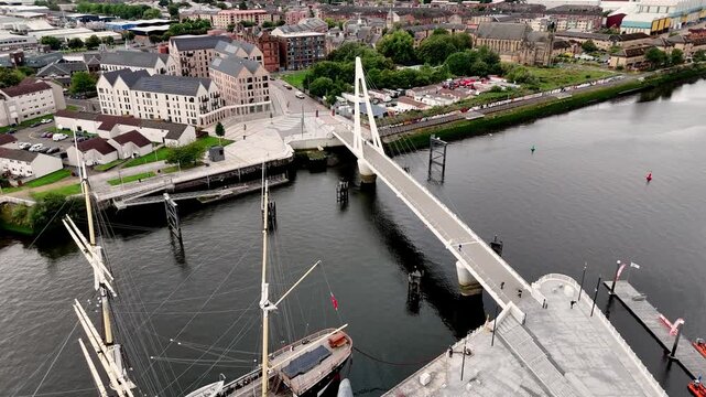 Aerial fly toward Govan across the River Clyde in Glasgow