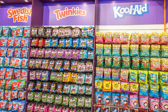 Assorted bags of sweets and treats in a modern candy store. London, UK, 2 June 2024