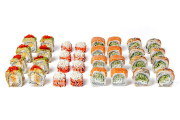 Large sushi set with Philadelphia roll, eel roll, tartare roll and hosomaki on a white background isolated for menu © Анатолій Патрашок