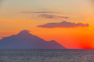 Fototapeta premium Silhouette of mount Athos at sunrise, Greece