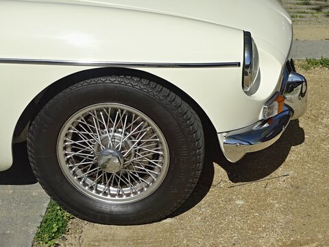 White MG MGB classic British roadster showing wire wheel