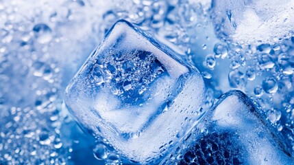 Obraz premium Ice cubes sitting in clear water with a blue texture in a summer drink close up