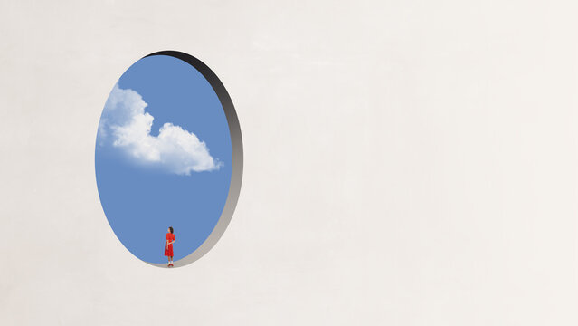 Surreal artwork woman standing inside oval sky portal. Concept of mental escape, new perspective, lifestyle inspiration, creative freedom, branding visuals and modern conceptual advertising.