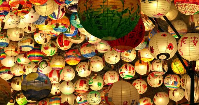 The park displays thousands of paper lanterns hand-painted by locals, symbolizing the traditional culture of the Lantern Festival and the community's shared wishes for blessings.