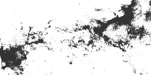 Textured dark grey splotches and speckles on a stark white background grunge abstract