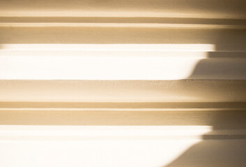Fototapeta premium Sunlight through the blinds on the window, vintage tone.