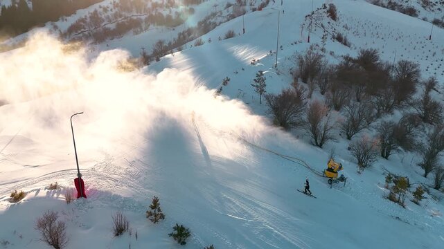 Aerial view skier racing at ski resort with snow
