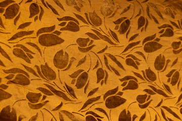 Gold floral jacquard fabric texture background