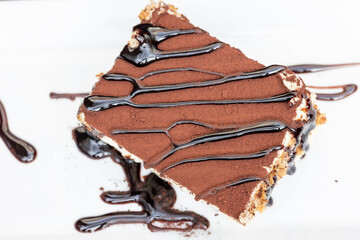 Close-Up of Coffee Tiramisu with Chocolate Sauce