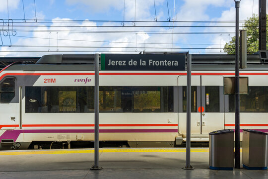 Jerez de la Frontera, Spain - March 29, 2024: Renfe Passenger Train at the Platform of Jerez de la Frontera Railway Station in Andalusia
