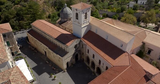 Aerial view of the small church of San Francesco, located in the historic center of Tropea, Calabria, Italy. This chapel was once dedicated to San Pietro ad Ripas. In front is a small square.