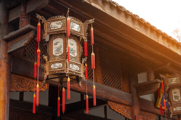 
Traditional Chiense lanterns hanging under the eaves of ancient architecture