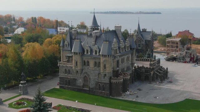 Garibaldi castle stands by volga river in autumn 04