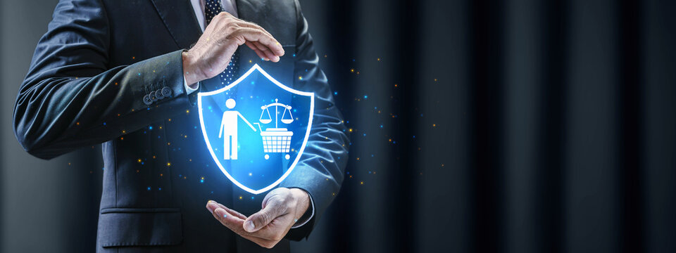 A businessman in a dark suit holds a glowing blue shield symbol featuring a shopper and justice scales, representing consumer protection and retail law