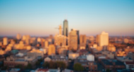 Fototapeta premium Golden hour cityscape featuring warm bokeh effect and copy space