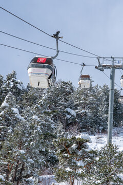 Arinsal, Andorra &ndash; February 2, 2026: Access gondola to the Arinsal ski resort on a snowy winter day.