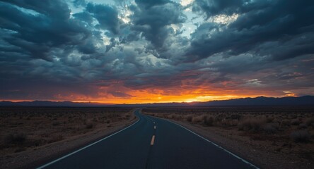 Naklejka premium Desert landscape at dusk with curving road and powerful sky clouds offering copy space