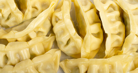 Naklejka premium Gyoza chinese dumplings textured pattern