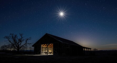 A bright star shining over the stable under a clear night sky