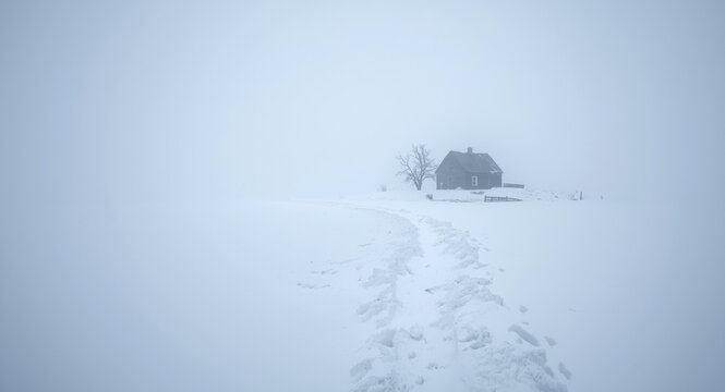 Blizzard swept snowy expanse with visible human paths and rustic house illustrating ice desert warming