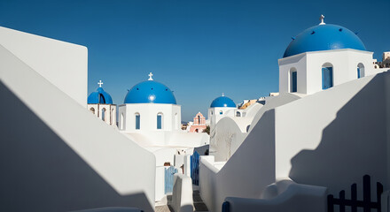 Obraz premium Minimalist White Architecture with Blue Domes in Santorini